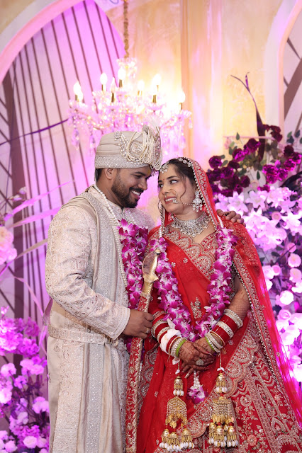 A couple photographed together at their wedding